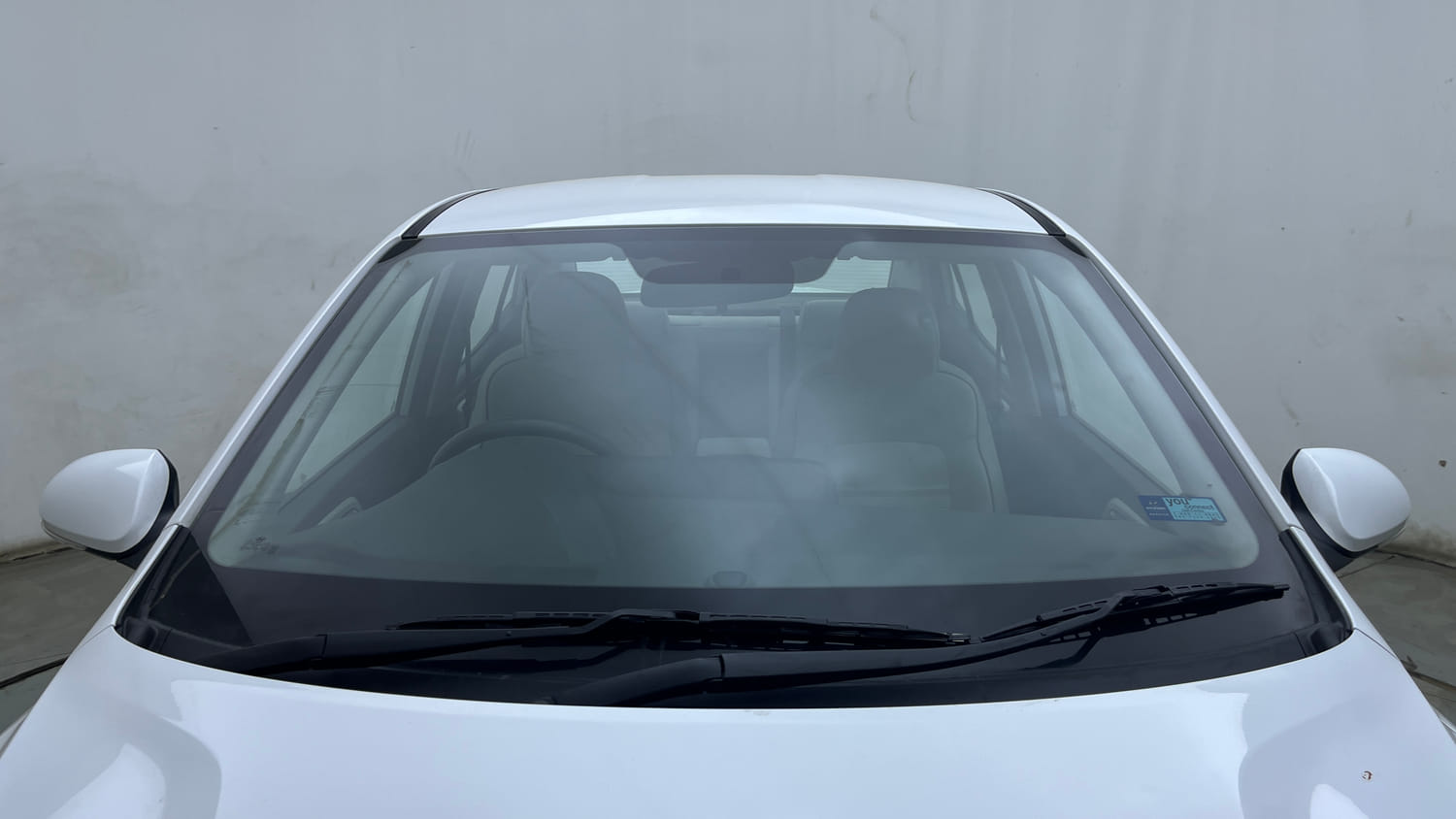 Used 2024 Hyundai Aura SX 1.2 (O) Petrol Petrol Manual exterior FRONT WINDSHIELD VIEW
