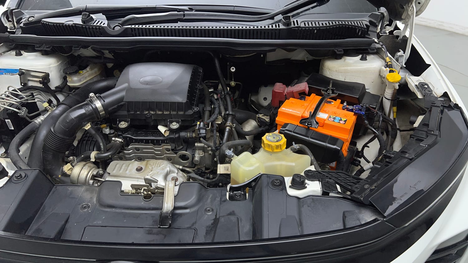 Used 2024 tata Nexon Fearless S 1.2 Revotron Petrol 7DCA Dual Tone Petrol Automatic engine ENGINE LEFT SIDE VIEW