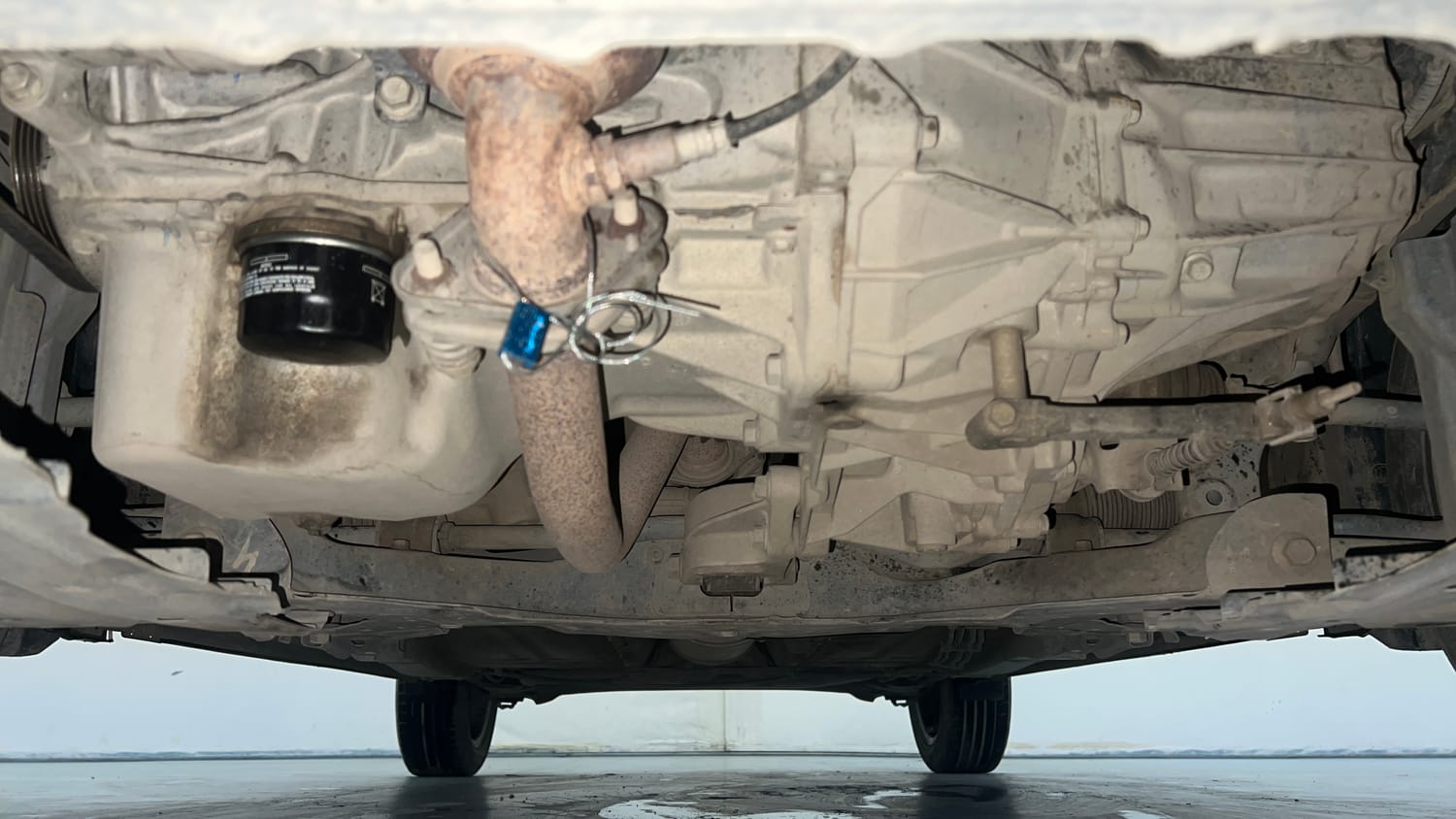 Used 2021 Maruti Suzuki Baleno Zeta Petrol Manual extra FRONT LEFT UNDERBODY VIEW