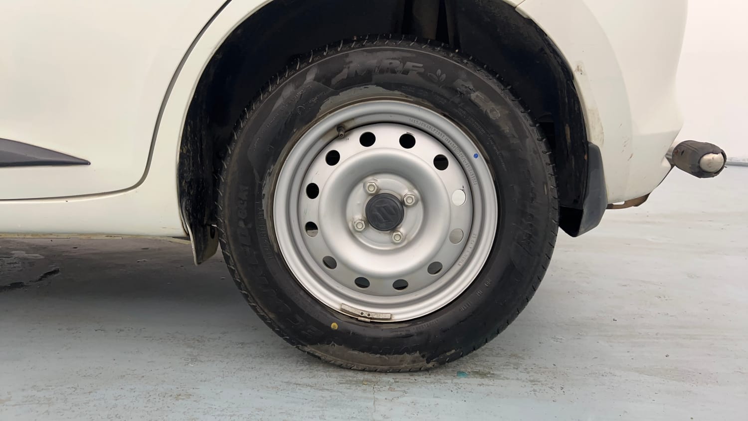Used 2025 Maruti Suzuki Swift LXi Petrol Manual tyres LEFT REAR TYRE RIM VIEW