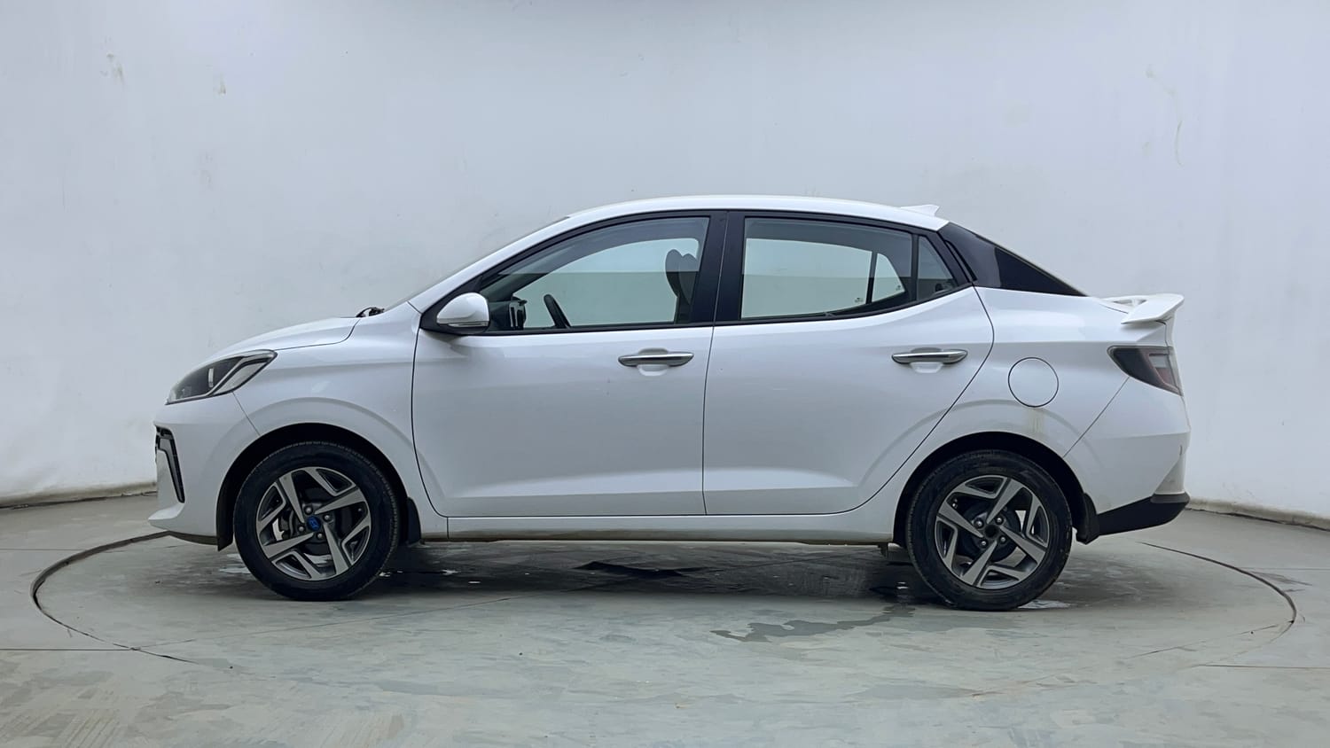 Used 2024 Hyundai Aura SX 1.2 (O) Petrol Petrol Manual exterior LEFT SIDE VIEW