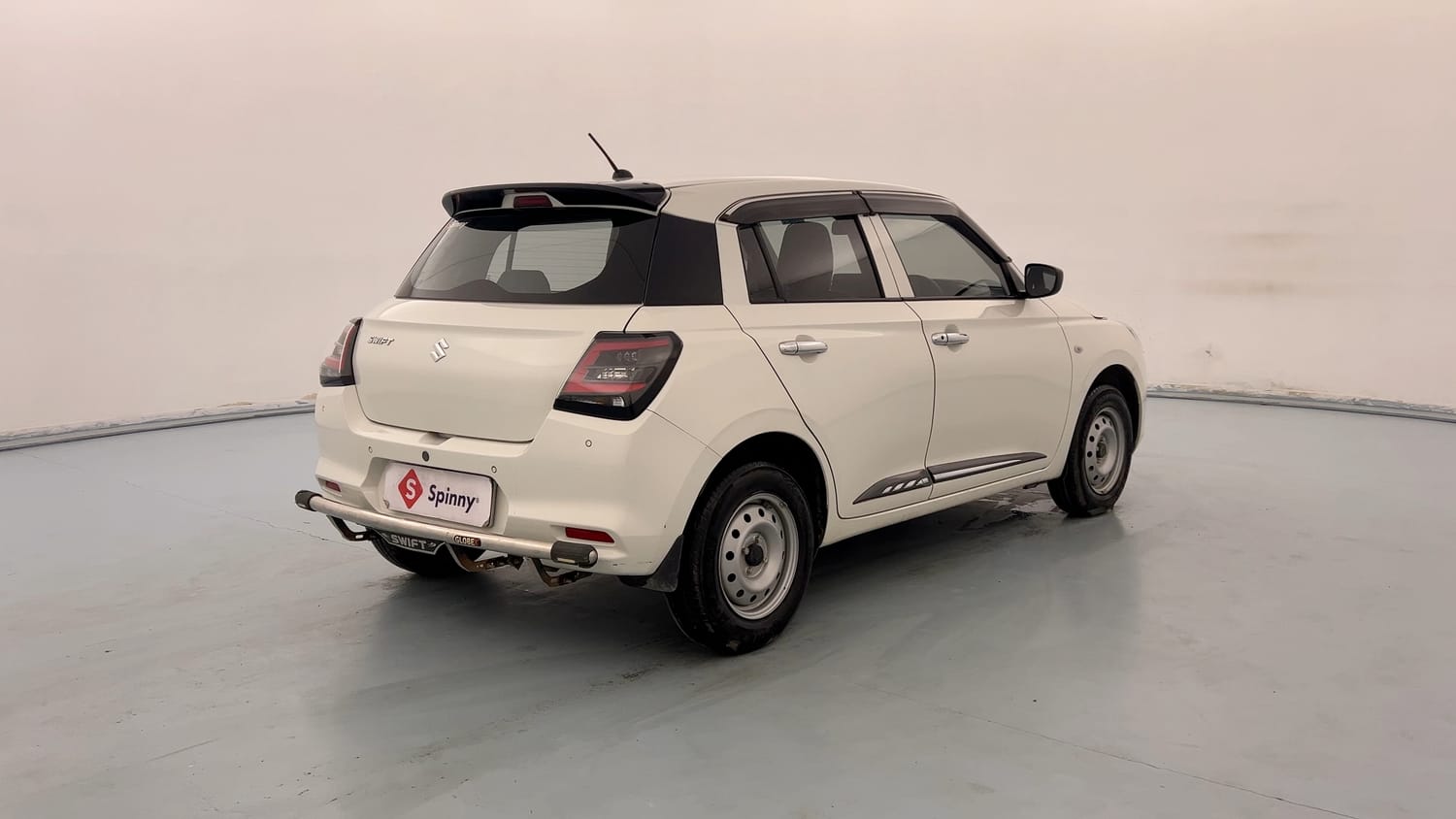 Used 2025 Maruti Suzuki Swift LXi Petrol Manual exterior RIGHT REAR CORNER VIEW
