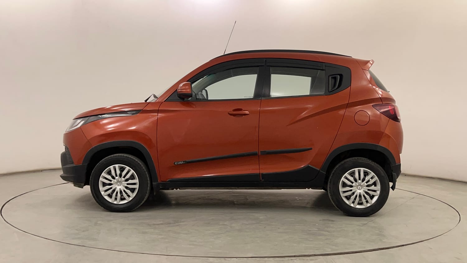 Used 2016 Mahindra KUV100 K6 6 STR Petrol Manual exterior LEFT SIDE VIEW