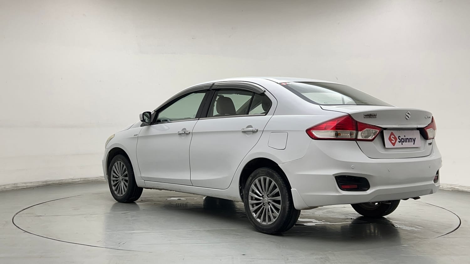 Used 2015 Maruti Suzuki Ciaz ZXI+ Petrol Manual exterior LEFT REAR CORNER VIEW
