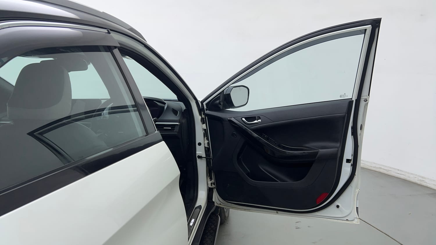 Used 2024 tata Nexon Fearless S 1.2 Revotron Petrol 7DCA Dual Tone Petrol Automatic interior RIGHT FRONT DOOR OPEN VIEW