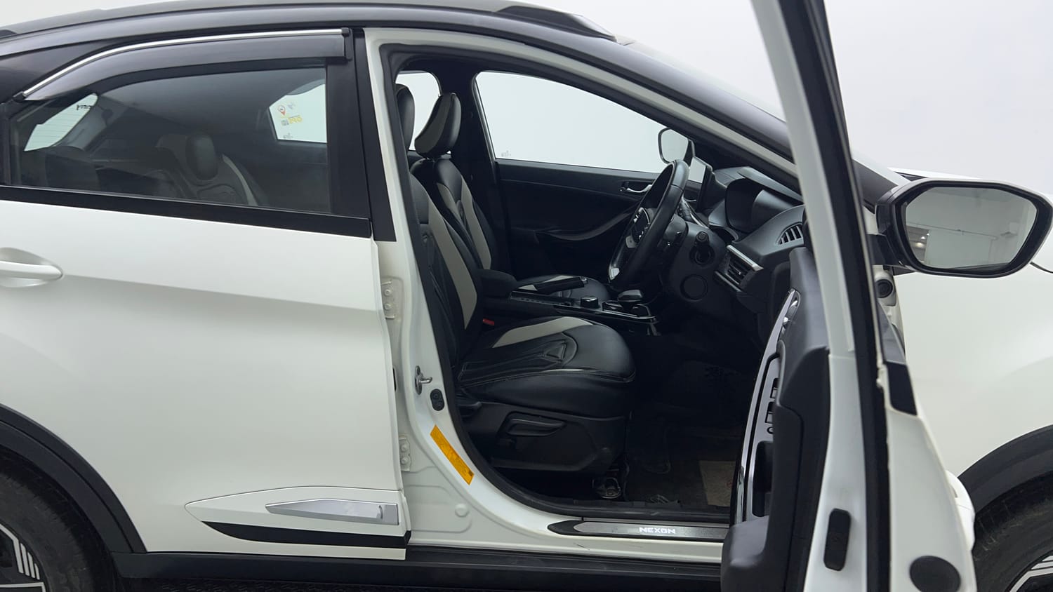 Used 2024 tata Nexon Fearless S 1.2 Revotron Petrol 7DCA Dual Tone Petrol Automatic interior RIGHT SIDE FRONT DOOR CABIN VIEW