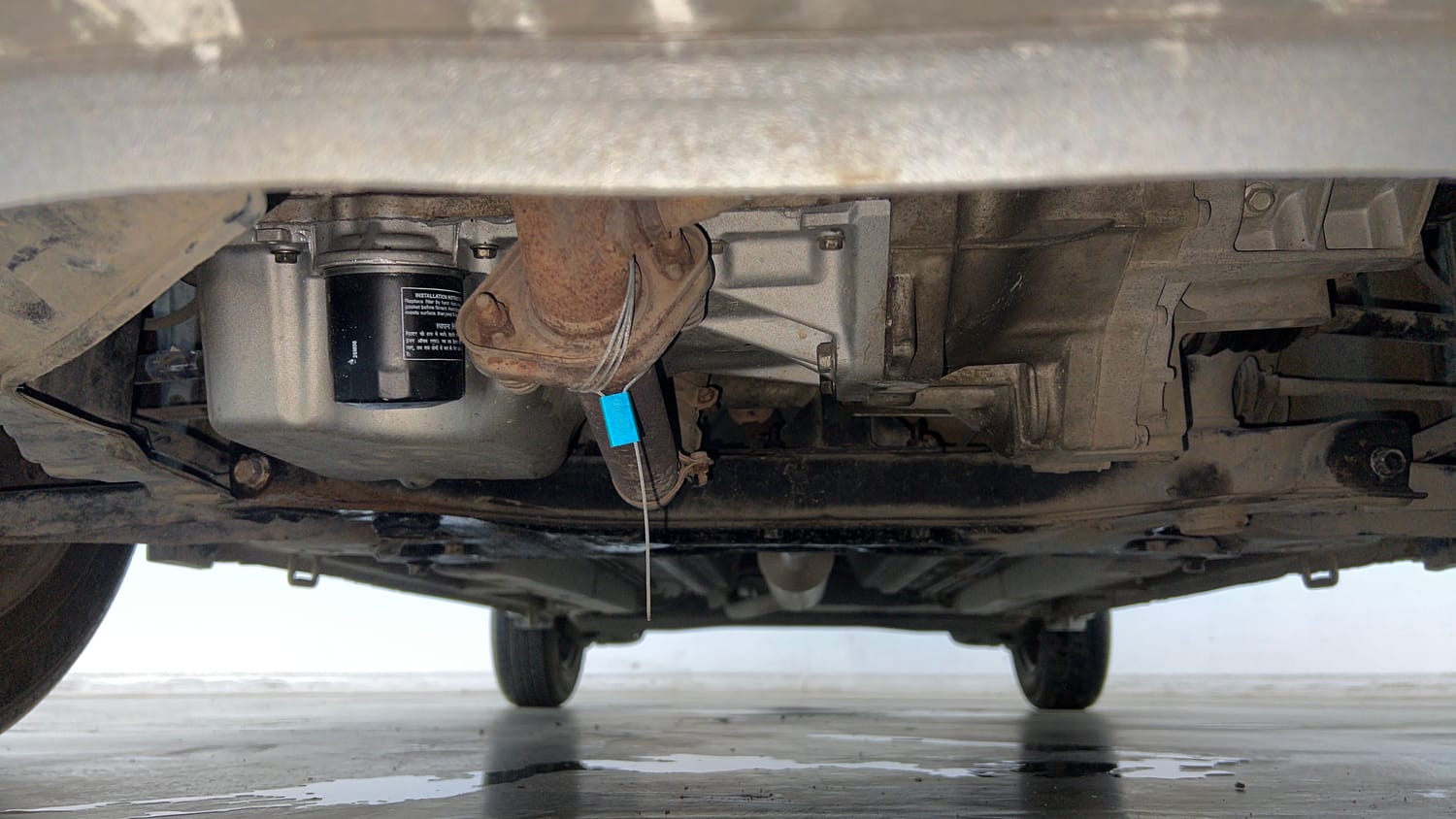 Used 2015 Maruti Suzuki Ritz Lxi BS-IV Petrol Manual extra FRONT LEFT UNDERBODY VIEW