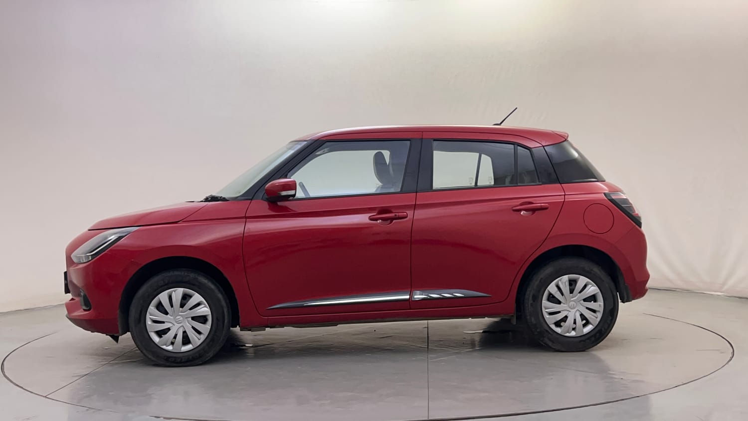 Used 2024 Maruti Suzuki Swift VXi Petrol Manual exterior LEFT SIDE VIEW