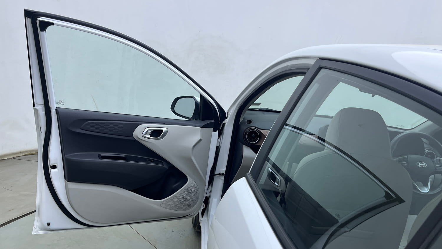 Used 2024 Hyundai Aura SX 1.2 (O) Petrol Petrol Manual interior LEFT FRONT DOOR OPEN VIEW