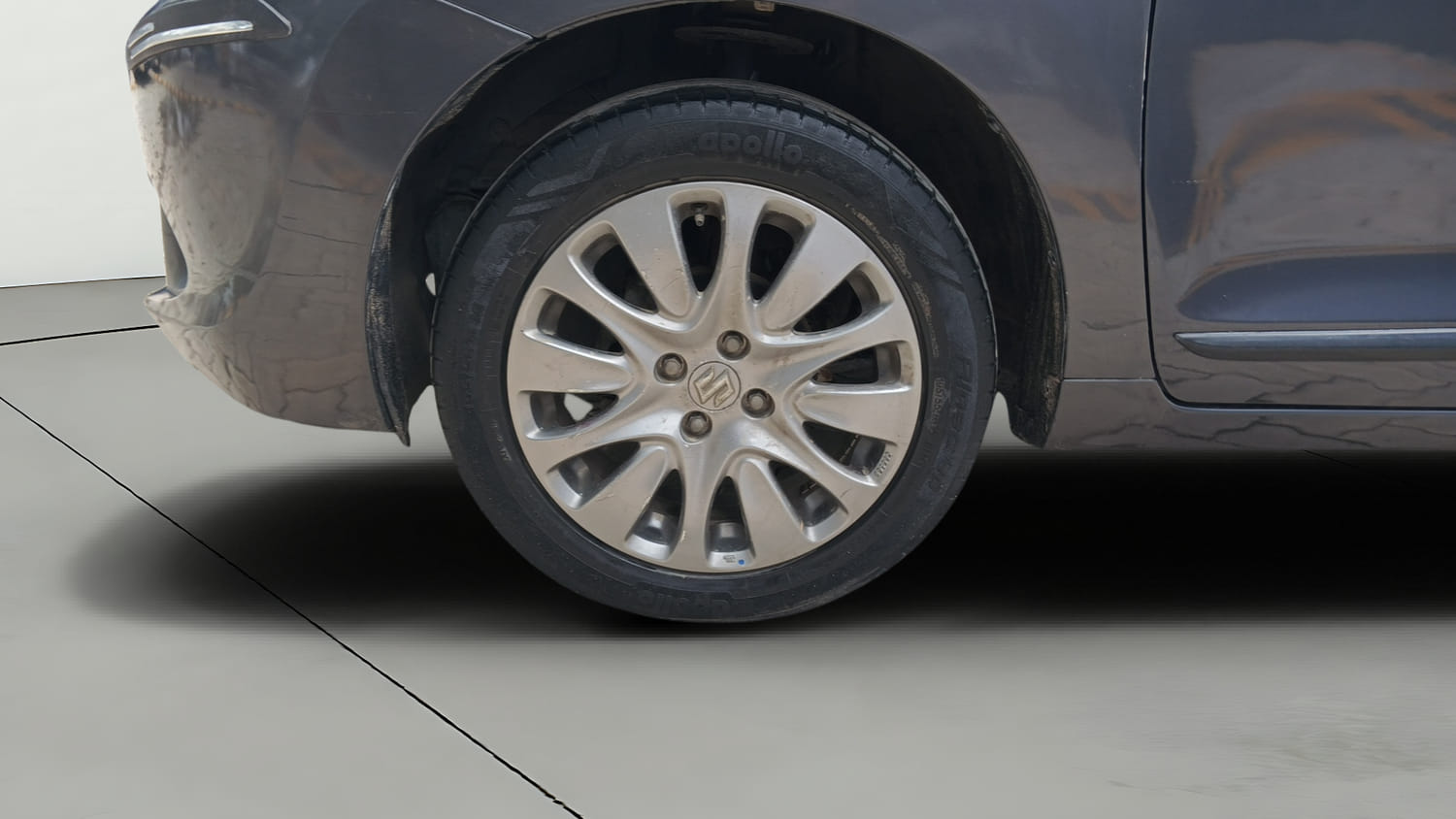 Used 2018 Maruti Suzuki Baleno Zeta 1.2 Petrol Manual tyres LEFT FRONT TYRE RIM VIEW