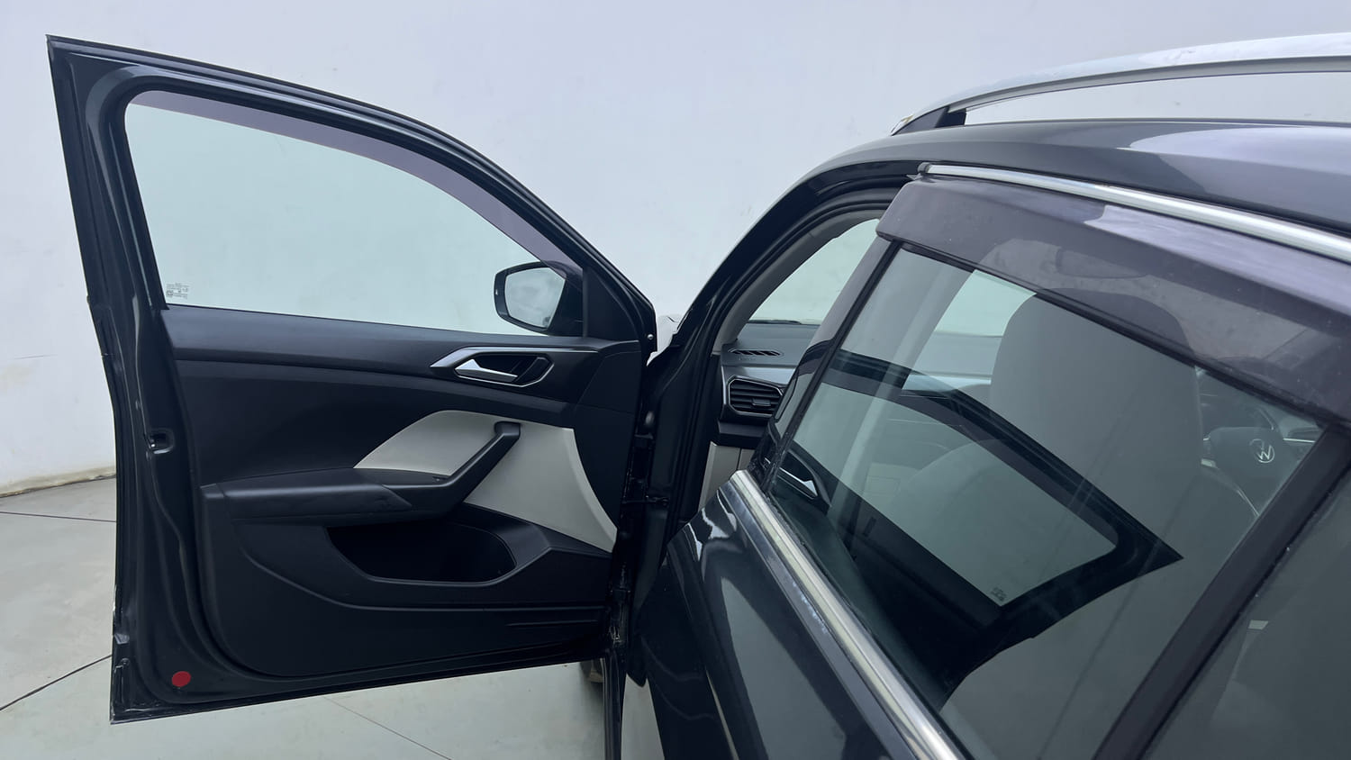 Used 2023 Volkswagen Taigun Topline 1.0 TSI MT Petrol Manual interior LEFT FRONT DOOR OPEN VIEW