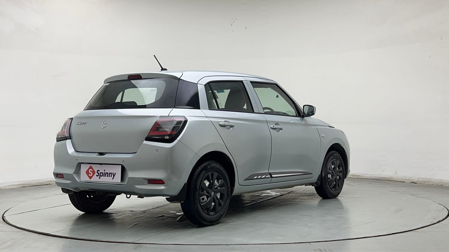 Used 2024 Maruti Suzuki Swift LXi Petrol Manual exterior RIGHT REAR CORNER VIEW