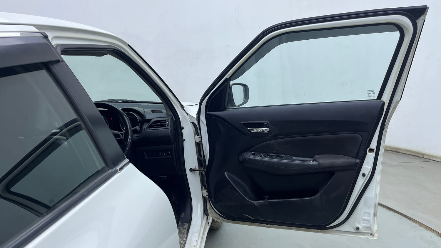 Used 2024 Maruti Suzuki Swift VXi Petrol Manual interior RIGHT FRONT DOOR OPEN VIEW