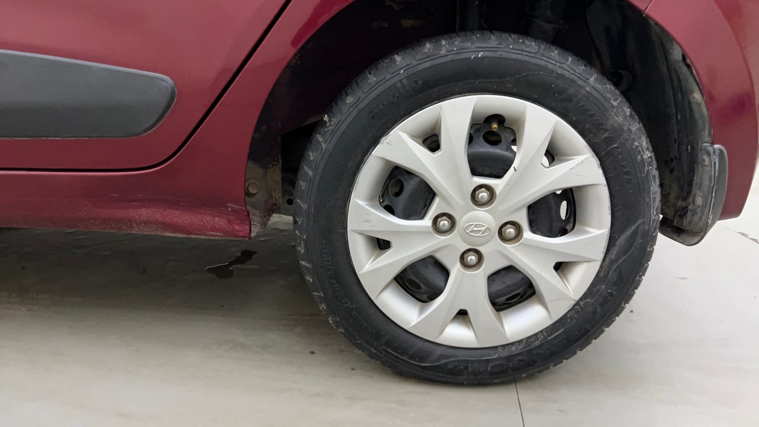 Used 2016 Hyundai Grand i10 Sportz 1.2 Kappa VTVT Petrol Manual tyres LEFT REAR TYRE RIM VIEW