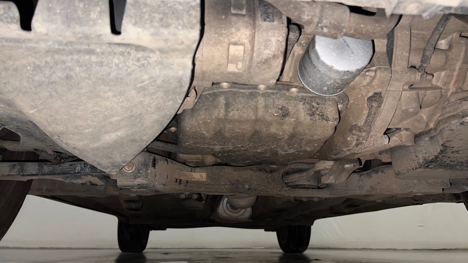 Used 2023 Volkswagen Taigun Topline 1.0 TSI AT Petrol Automatic extra FRONT LEFT UNDERBODY VIEW