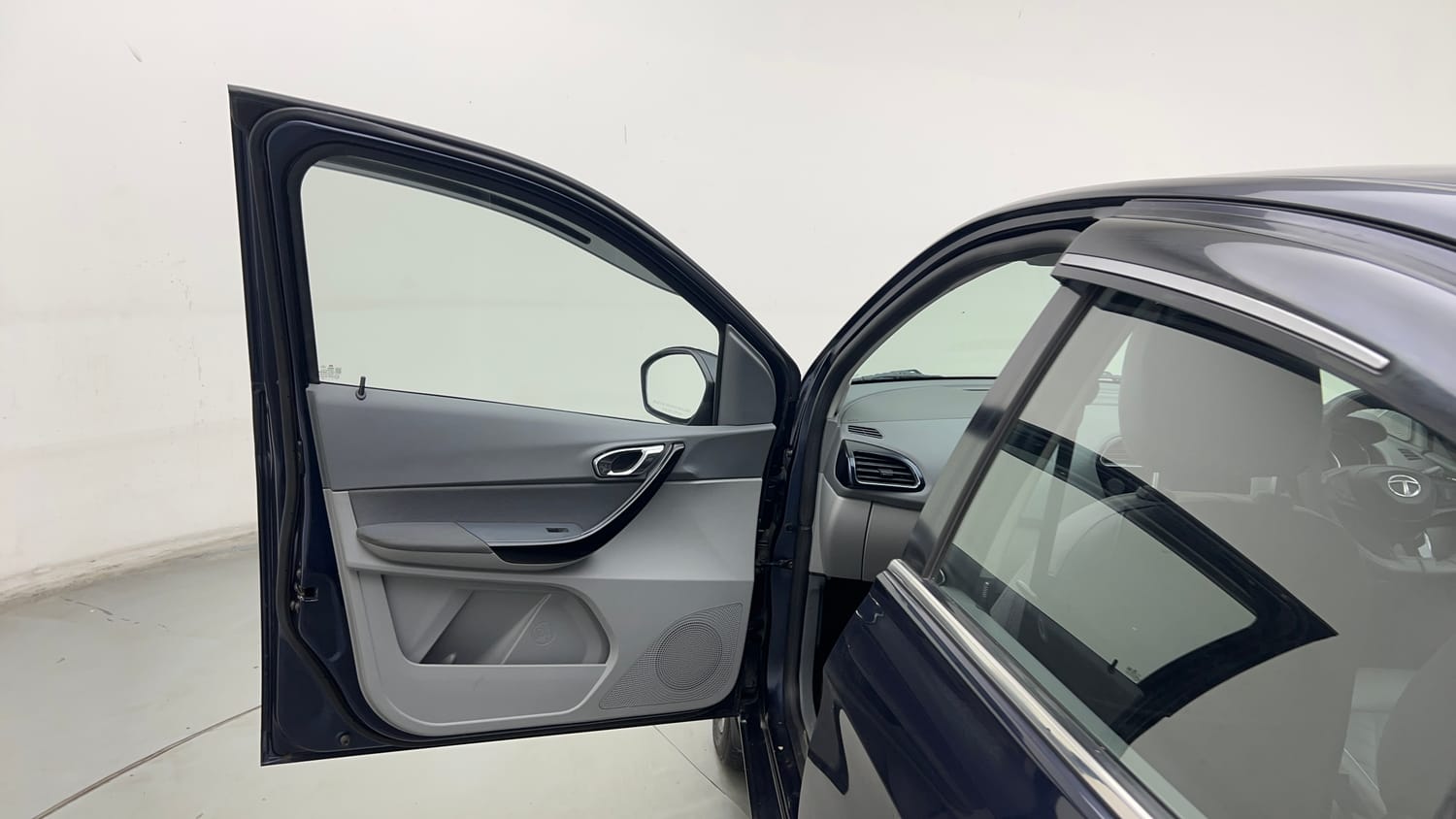 Used 2021 Tata Tigor XZ Plus Petrol Manual interior LEFT FRONT DOOR OPEN VIEW