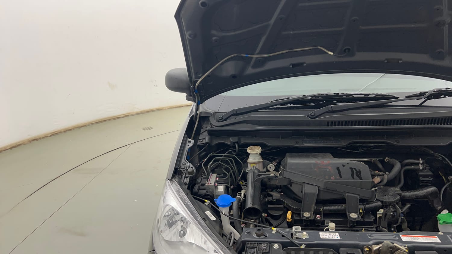Used 2026 Maruti Suzuki Alto K10 LXi (O) Petrol Manual engine ENGINE RIGHT SIDE HINGE & APRON VIEW