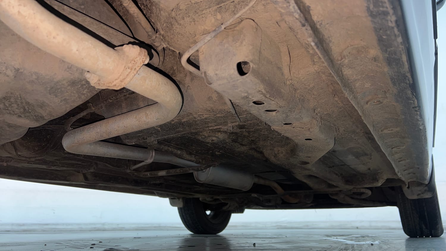 Used 2021 Tata Tigor XZ Plus Petrol Manual extra REAR RIGHT UNDERBODY VIEW