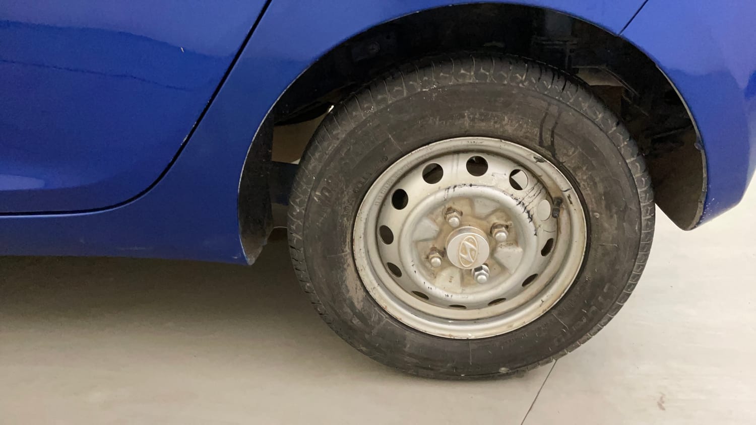 Used 2013 Hyundai Eon Era + Petrol Manual tyres LEFT REAR TYRE RIM VIEW