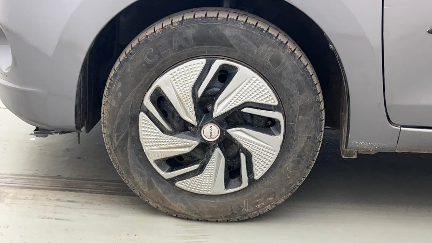 Used 2014 Maruti Suzuki Celerio LXi Petrol Manual tyres LEFT FRONT TYRE RIM VIEW