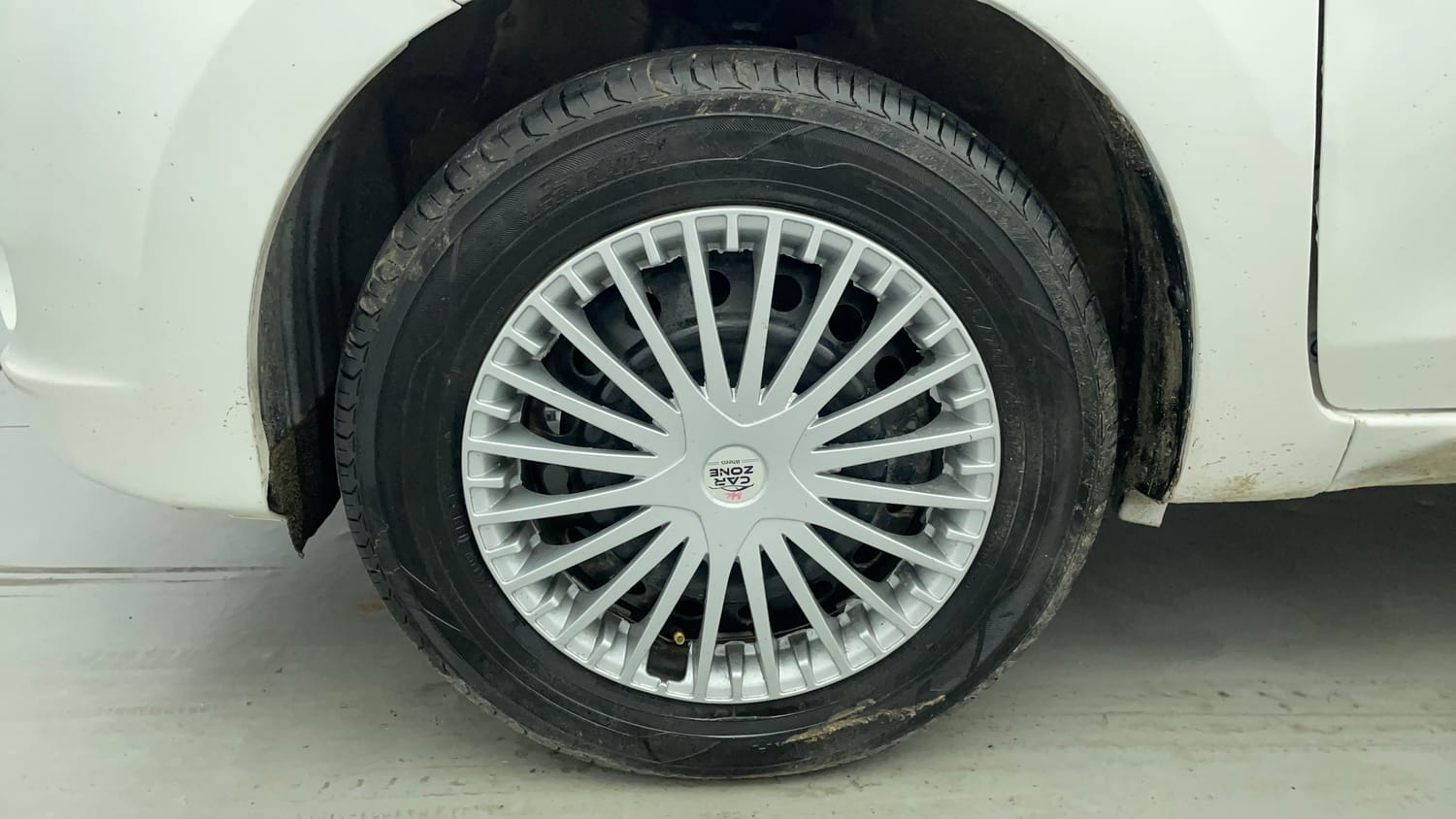 Used 2014 Maruti Suzuki Celerio VXi Petrol Manual tyres LEFT FRONT TYRE RIM VIEW