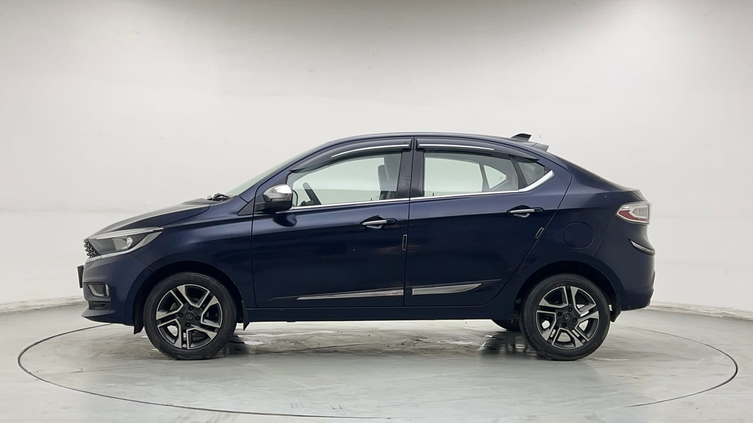 Used 2021 Tata Tigor XZ Plus Petrol Manual exterior LEFT SIDE VIEW