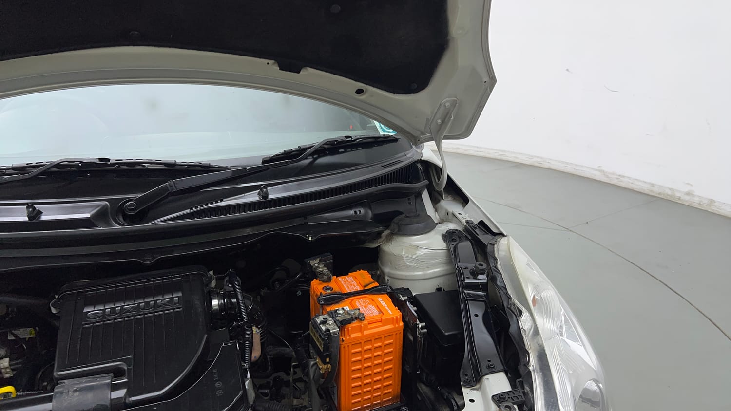 Used 2016 Maruti Suzuki Swift VXI (O) Petrol Manual engine ENGINE LEFT SIDE HINGE & APRON VIEW