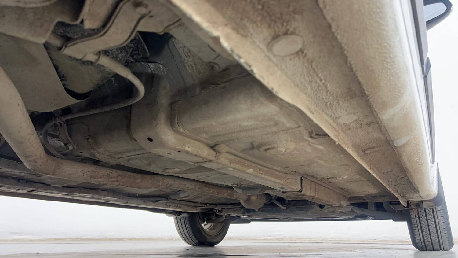 Used 2023 Hyundai Aura SX 1.2 CNG Cng Manual extra REAR RIGHT UNDERBODY VIEW