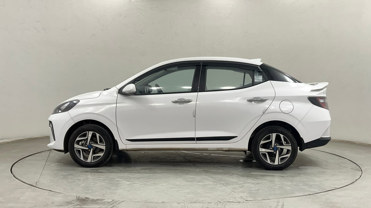 Used 2023 Hyundai Aura SX 1.2 CNG Cng Manual exterior LEFT SIDE VIEW