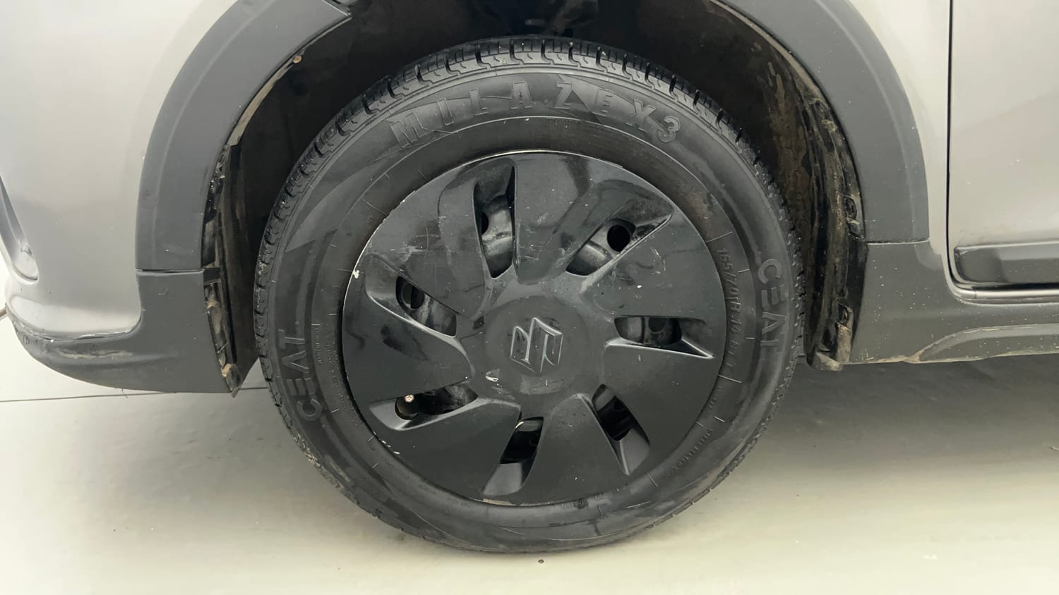 Used 2018 Maruti Suzuki Celerio X Zxi AMT Petrol Automatic tyres LEFT FRONT TYRE RIM VIEW