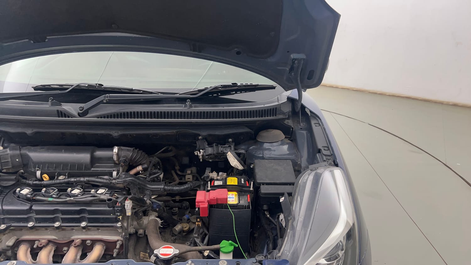 Used 2021 Maruti Suzuki Baleno Alpha Petrol Manual engine ENGINE LEFT SIDE HINGE & APRON VIEW