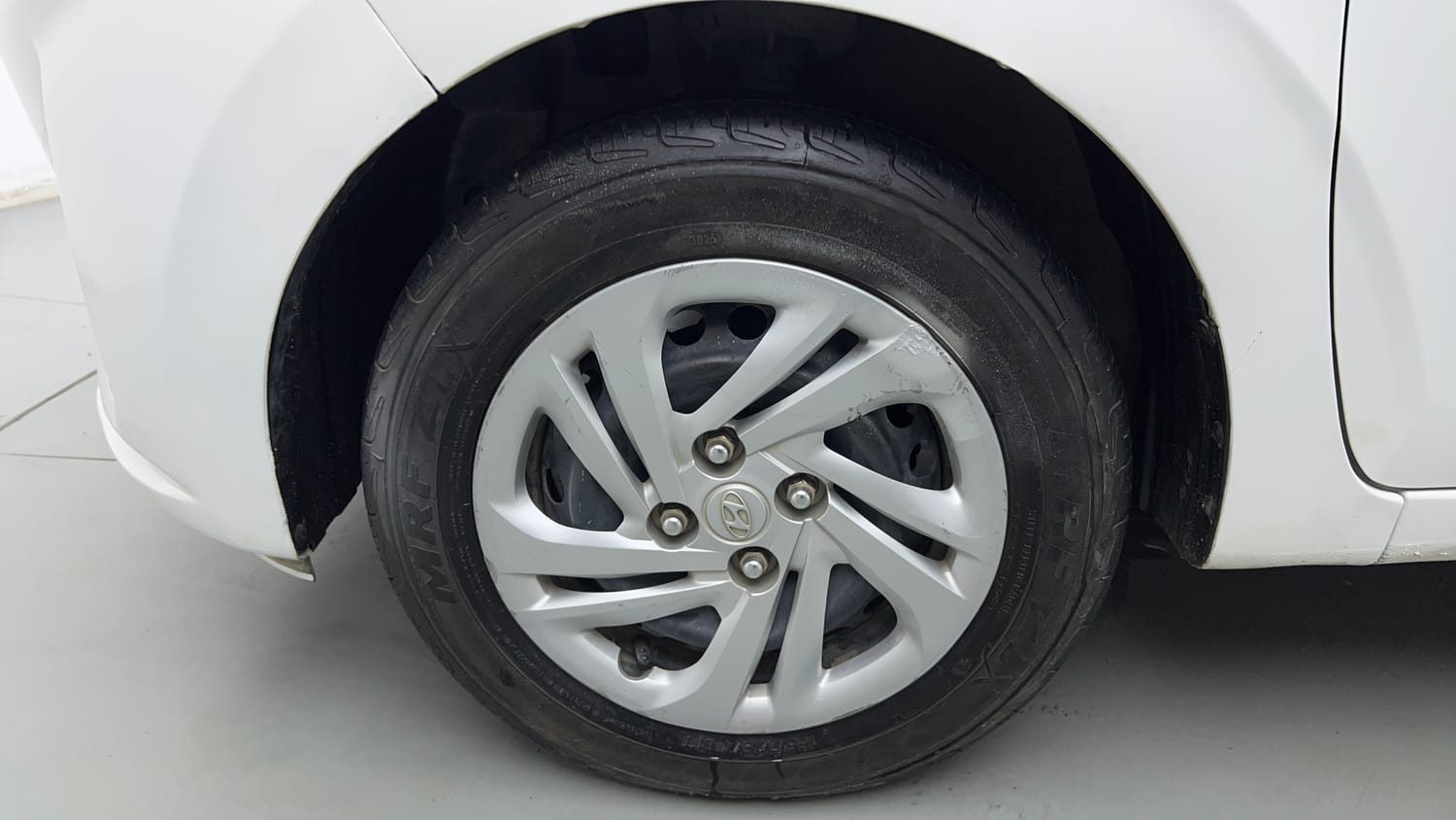Used 2021 Hyundai Aura S 1.2 CNG Cng Manual tyres LEFT FRONT TYRE RIM VIEW