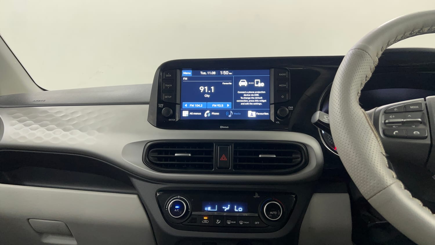 Used 2020 Hyundai Grand i10 Nios Sportz 1.2 Kappa VTVT Petrol Manual interior MUSIC SYSTEM & AC CONTROL VIEW