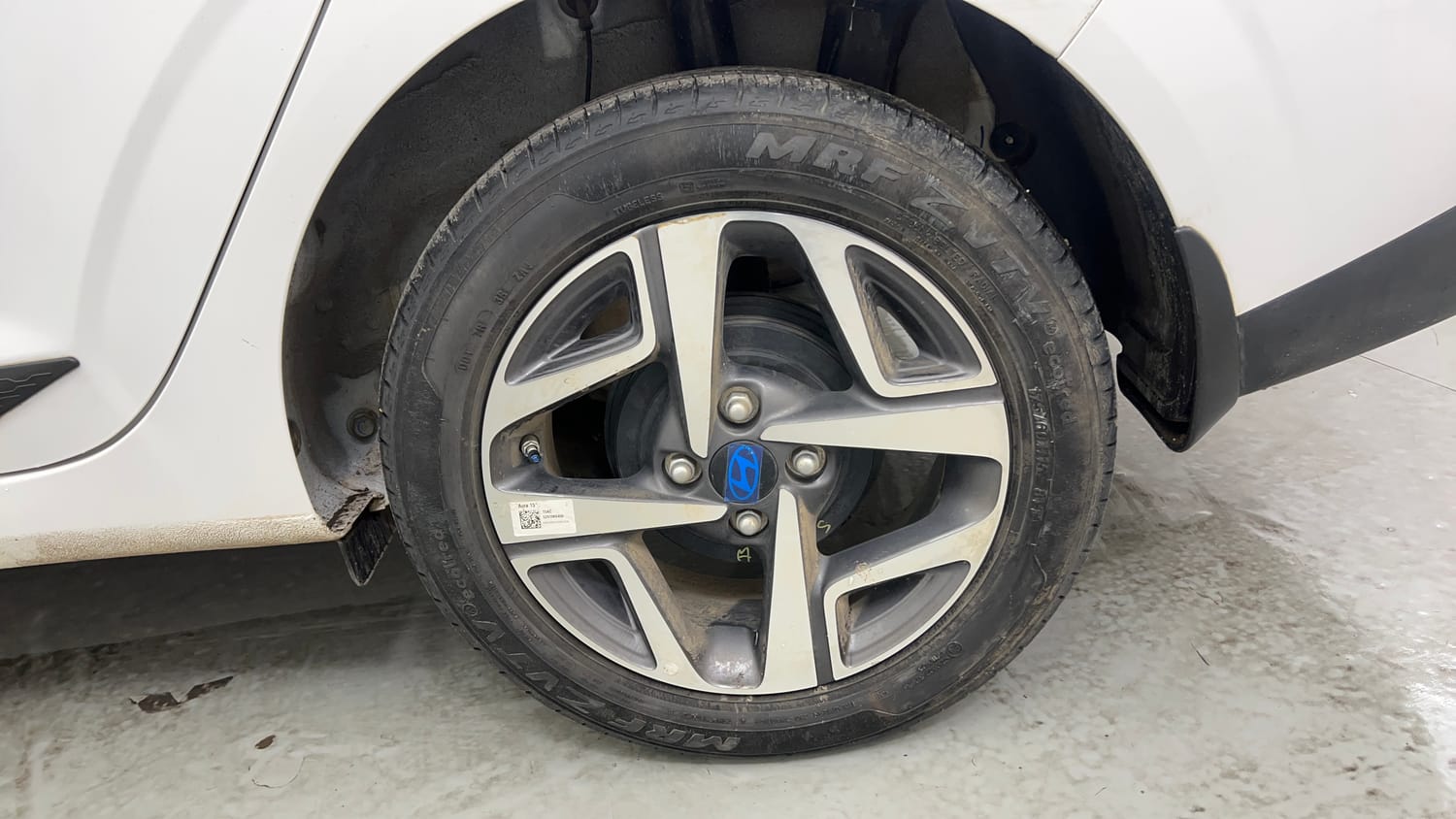 Used 2023 Hyundai Aura SX 1.2 CNG Cng Manual tyres LEFT REAR TYRE RIM VIEW