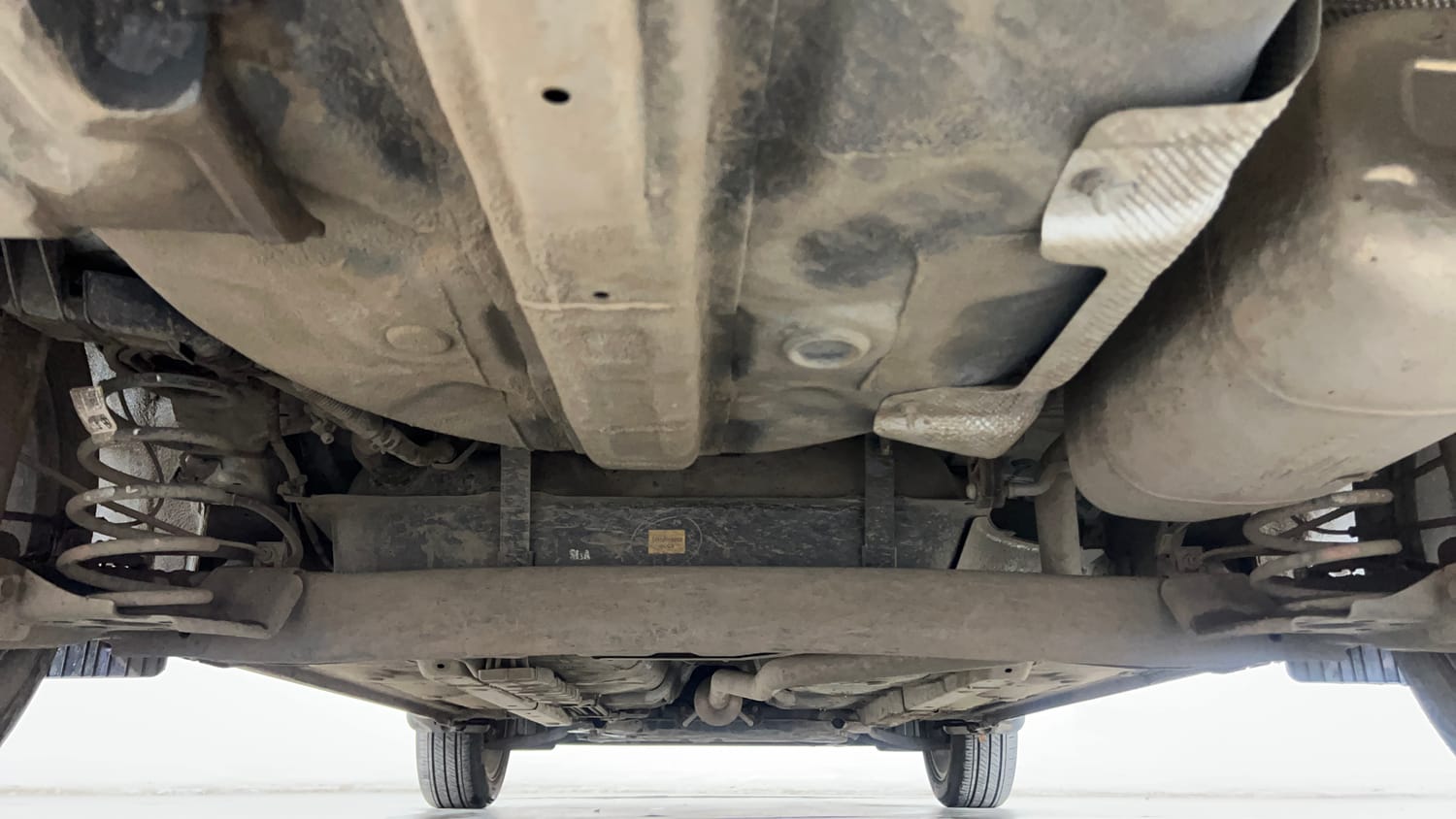 Used 2023 Hyundai Aura SX 1.2 CNG Cng Manual extra REAR UNDERBODY VIEW (TAKEN FROM REAR)
