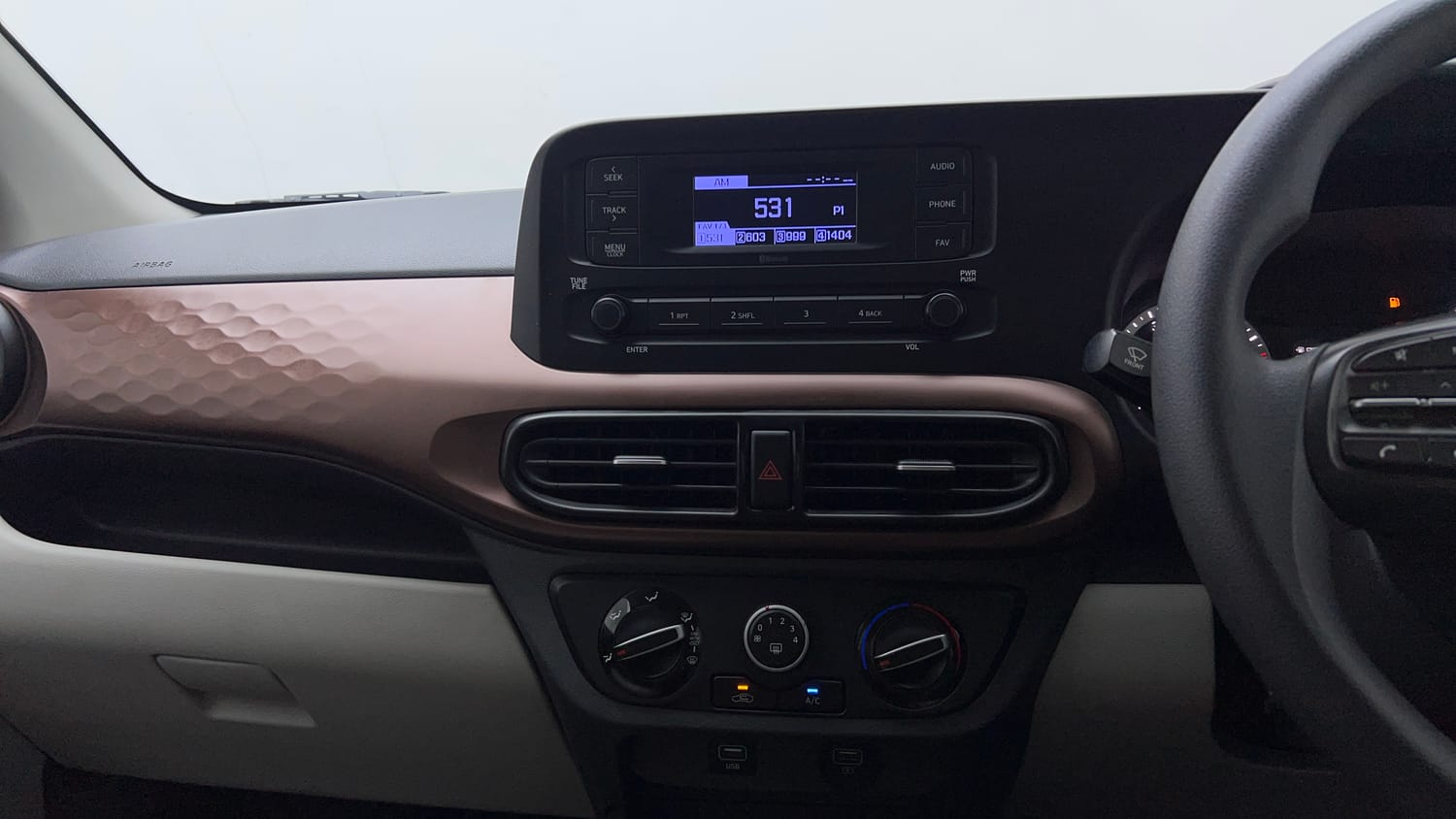 Used 2021 Hyundai Aura S 1.2 CNG Cng Manual interior MUSIC SYSTEM & AC CONTROL VIEW