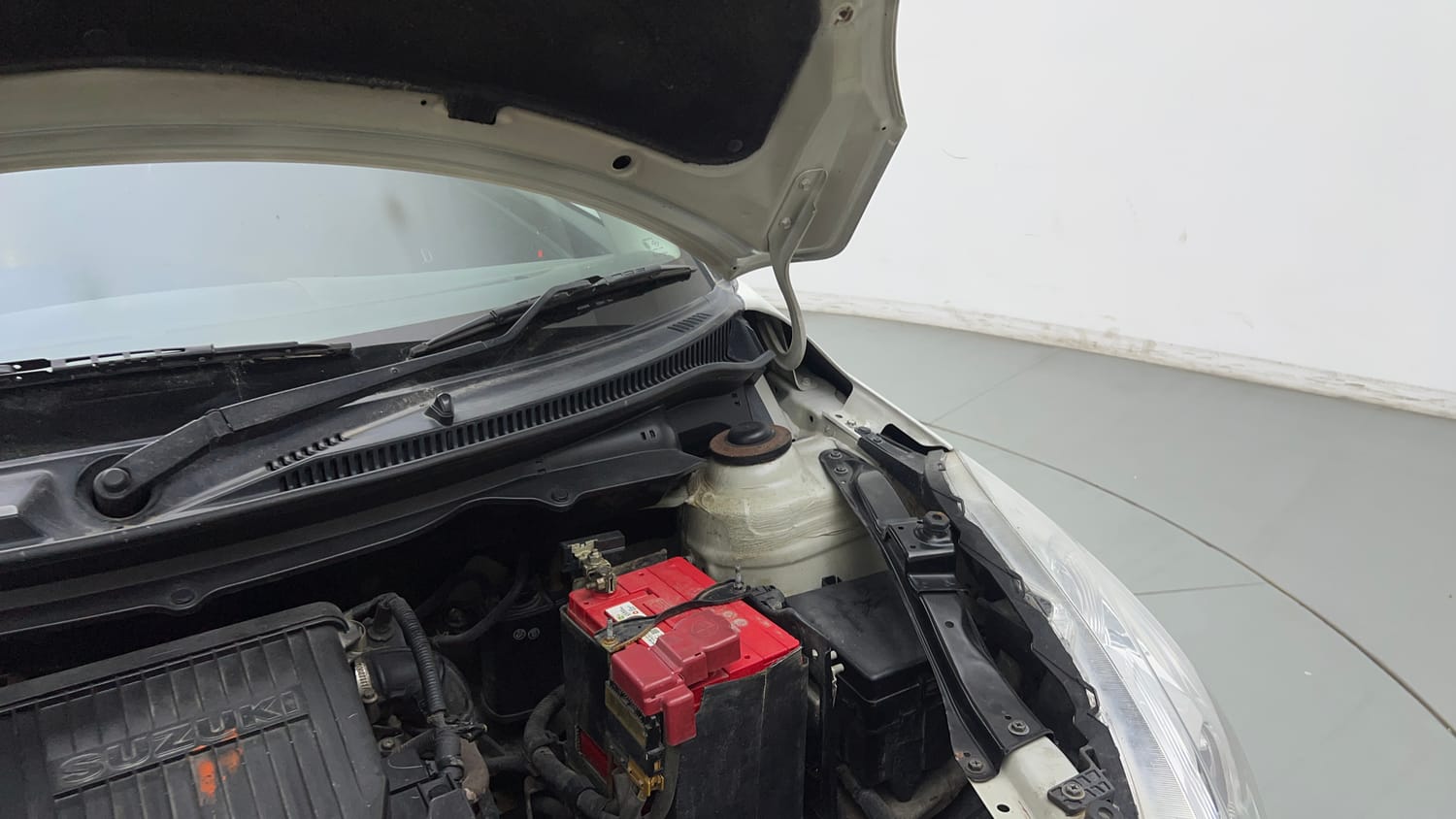 Used 2015 Maruti Suzuki Swift VXi Petrol Manual engine ENGINE LEFT SIDE HINGE & APRON VIEW