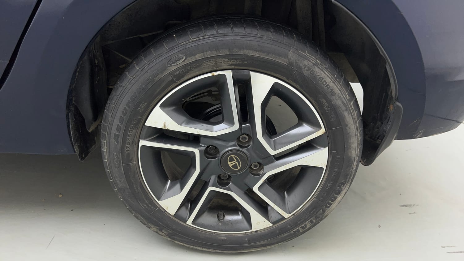 Used 2021 Tata Tigor XZ Plus Petrol Manual tyres LEFT REAR TYRE RIM VIEW