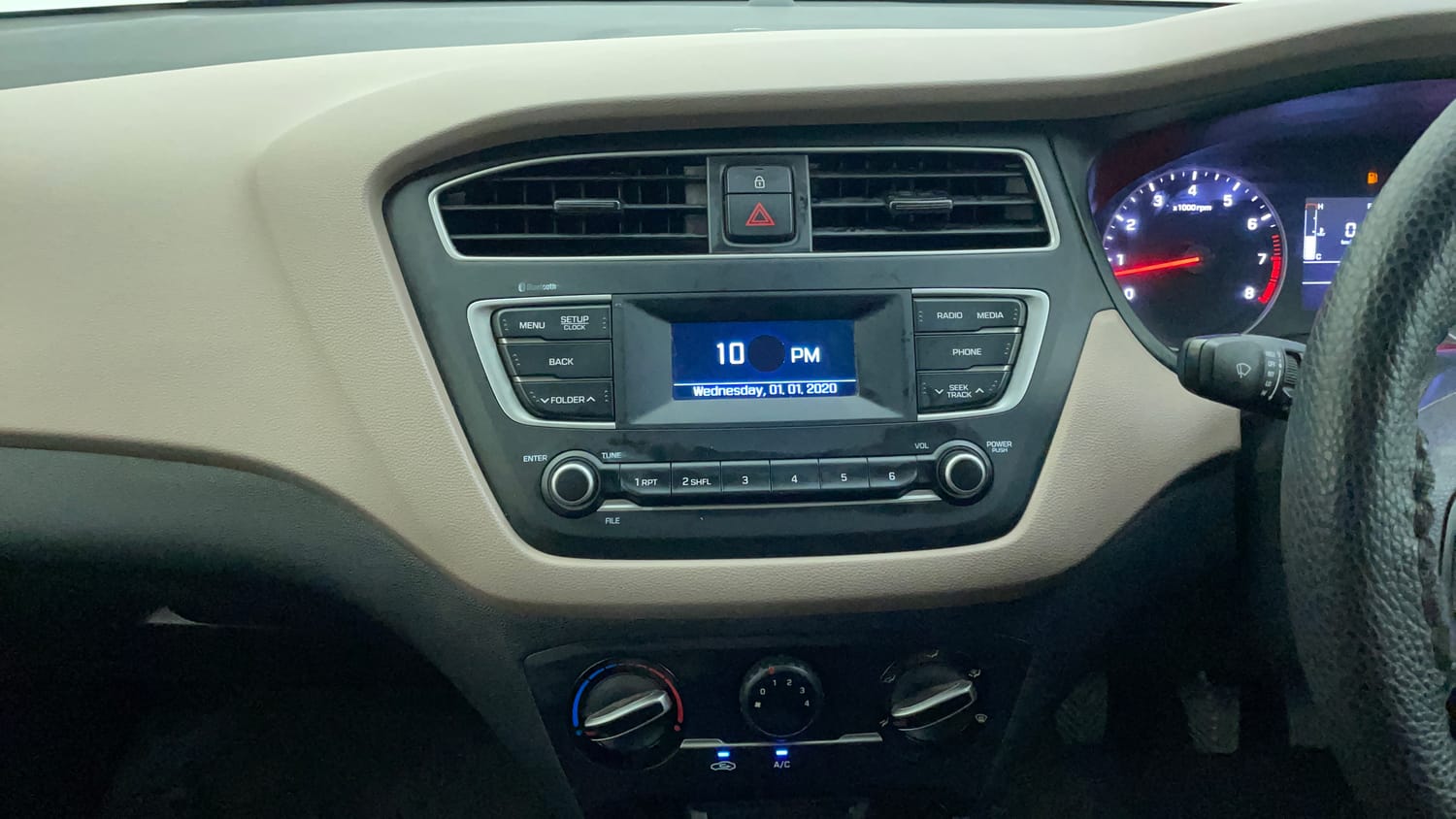 Used 2019 Hyundai Elite i20 Magna Plus 1.2 + CNG (Outside Fitted) Cng Manual interior MUSIC SYSTEM & AC CONTROL VIEW