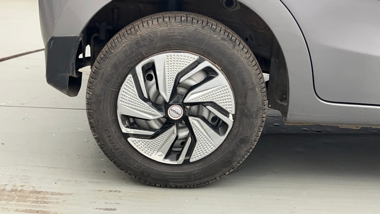 Used 2014 Maruti Suzuki Celerio LXi Petrol Manual tyres RIGHT REAR TYRE RIM VIEW