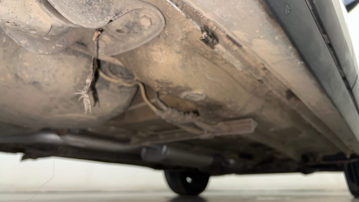 Used 2023 Volkswagen Taigun Topline 1.0 TSI AT Petrol Automatic extra REAR RIGHT UNDERBODY VIEW