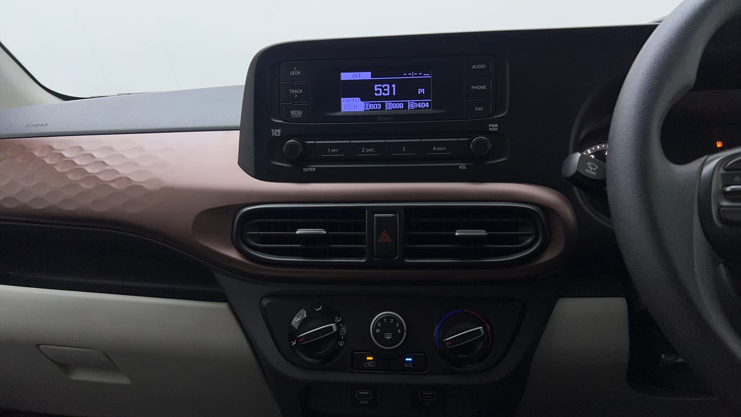 Used 2021 Hyundai Aura S 1.2 CNG Cng Manual top_features Integrated (in-dash) music system