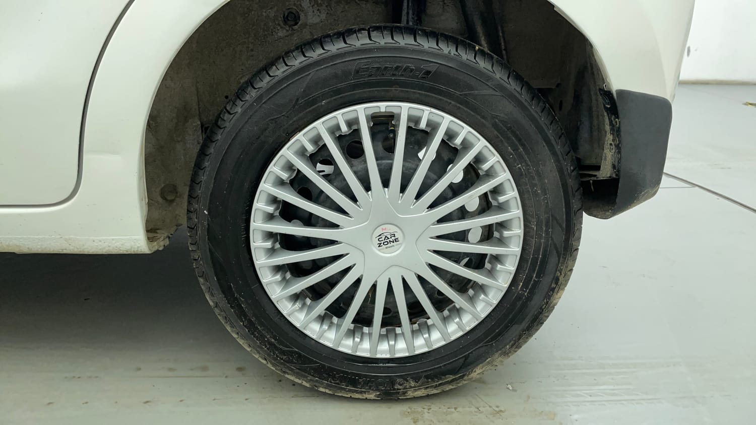 Used 2014 Maruti Suzuki Celerio VXi Petrol Manual tyres LEFT REAR TYRE RIM VIEW