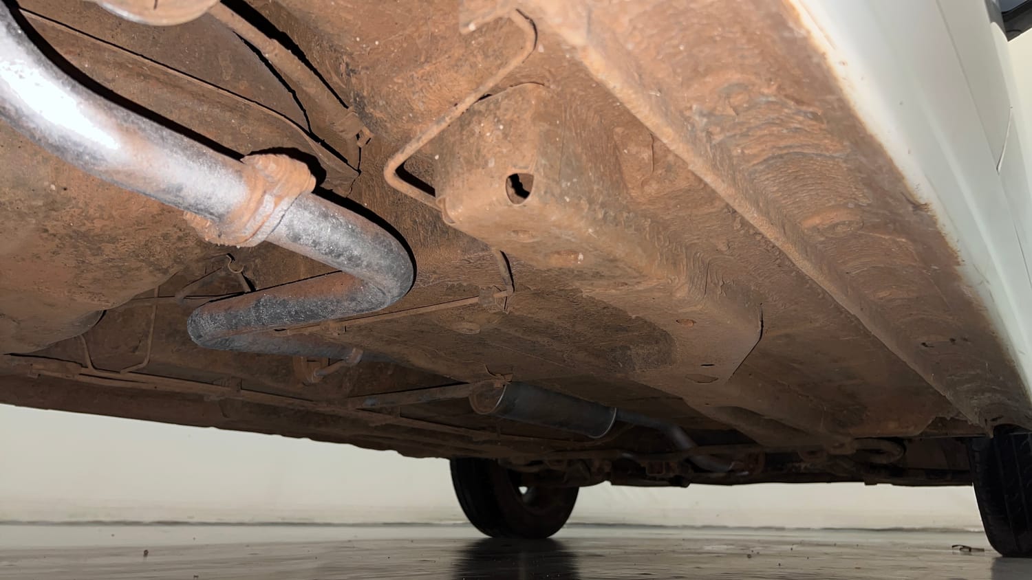 Used 2020 Tata Tiago XZA Plus Dual Tone Petrol Automatic extra REAR RIGHT UNDERBODY VIEW