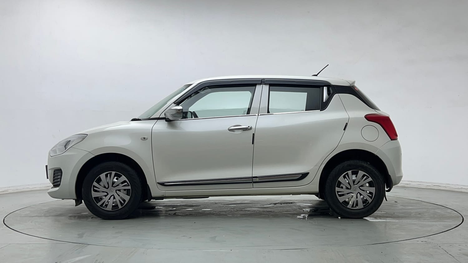 Used 2023 Maruti Suzuki Swift LXi Petrol Manual exterior LEFT SIDE VIEW