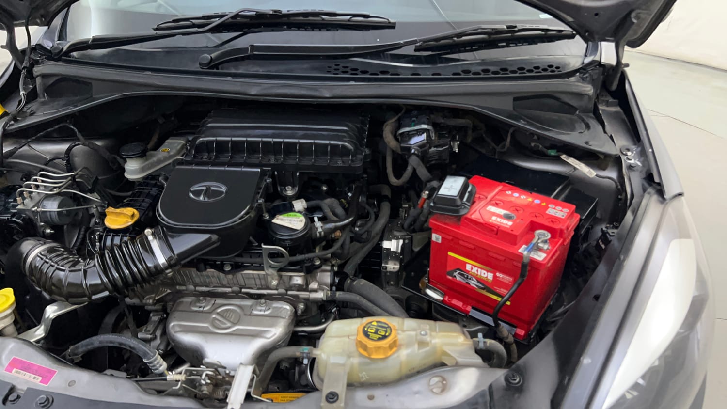 Used 2019 Tata Tiago Revotron XZA Plus Petrol Automatic engine ENGINE LEFT SIDE HINGE & APRON VIEW