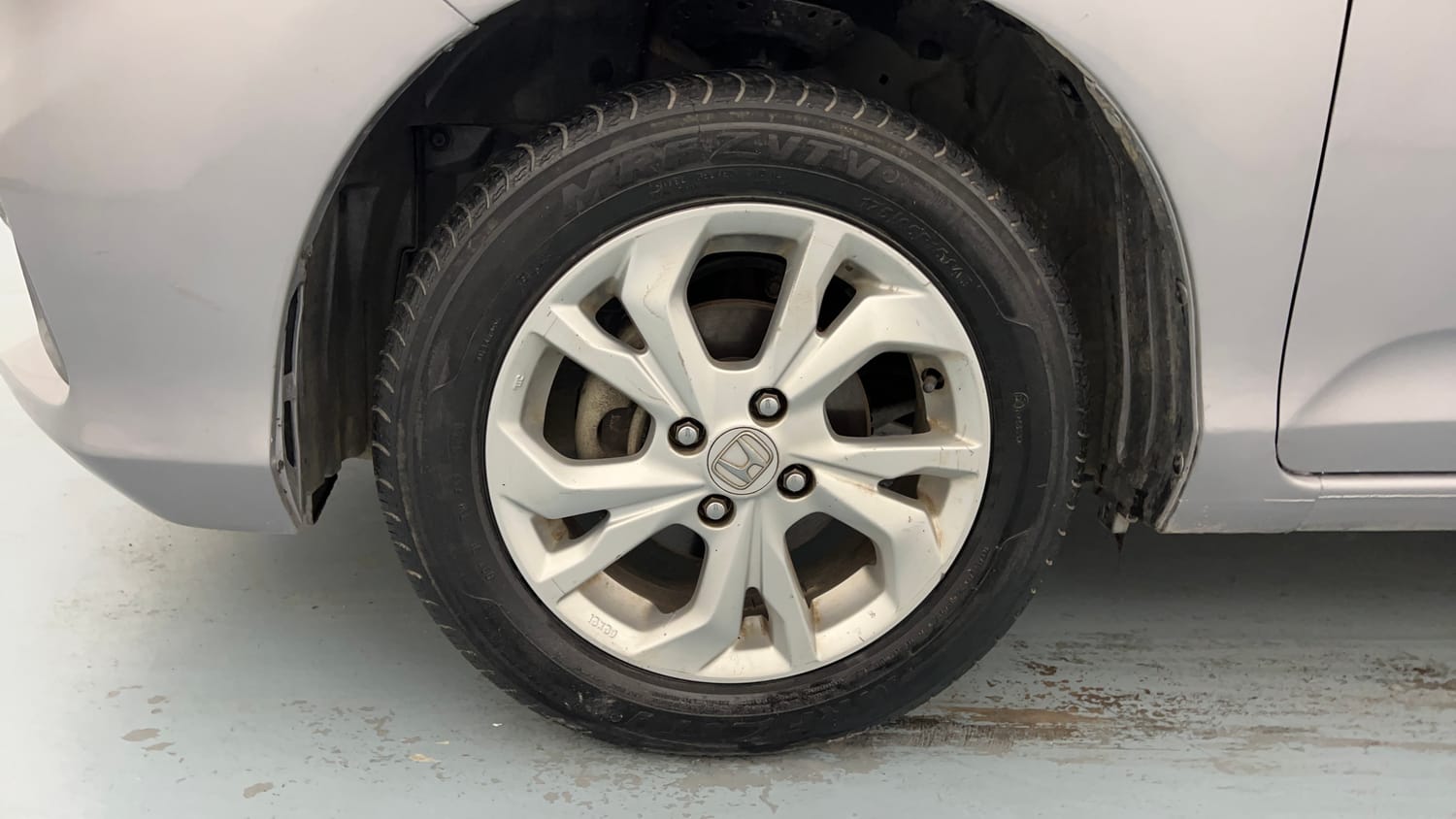 Used 2021 Honda Amaze 1.2 V MT Petrol Petrol Manual tyres LEFT FRONT TYRE RIM VIEW
