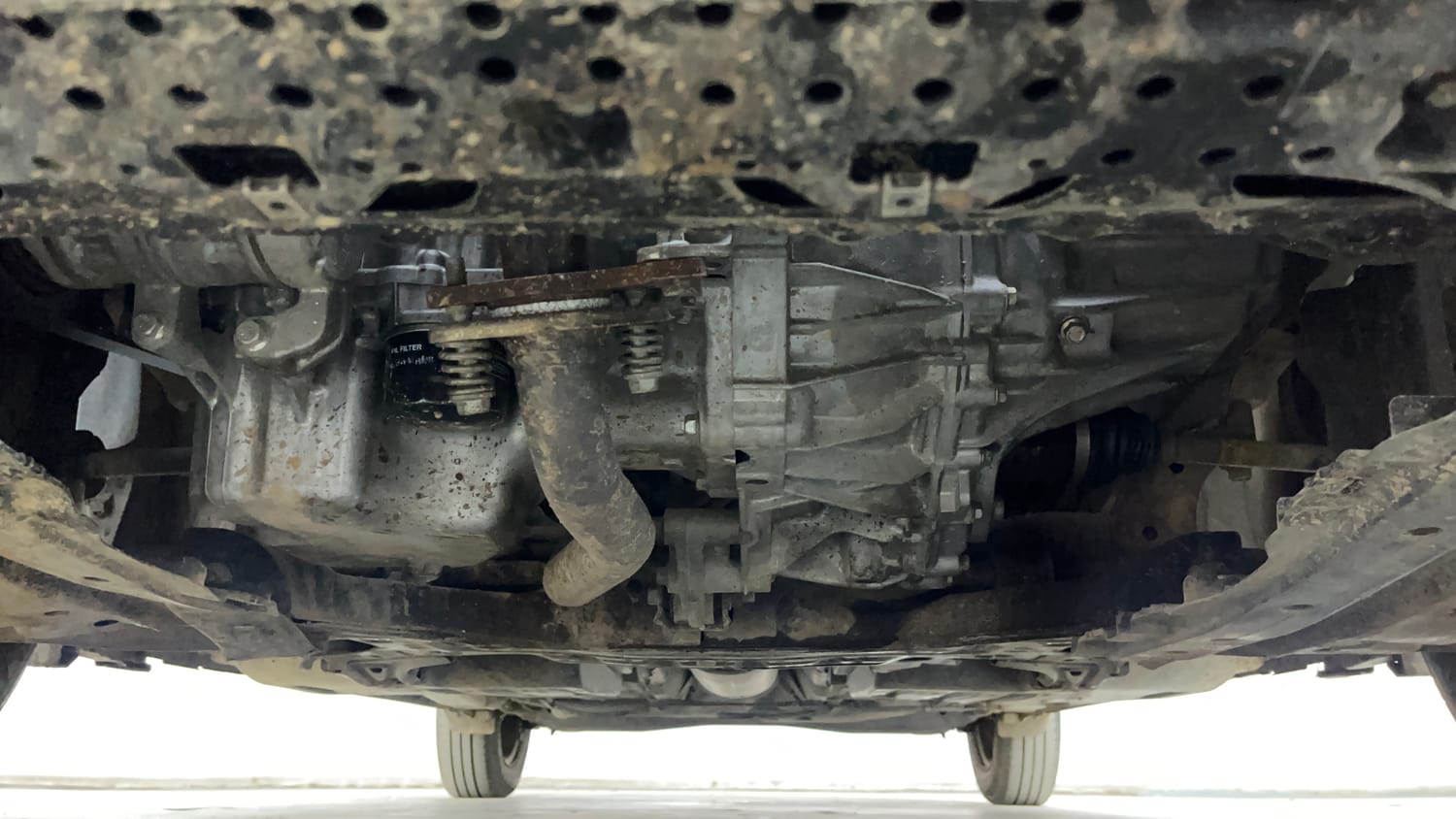 Used 2025 Maruti Suzuki Swift VXi (O) AMT Petrol Automatic extra FRONT LEFT UNDERBODY VIEW