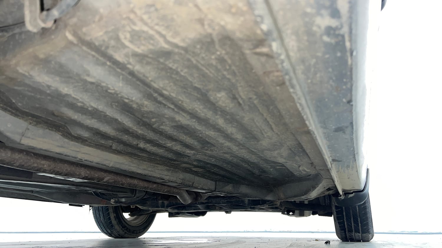 Used 2021 Honda Amaze 1.2 V MT Petrol Petrol Manual extra REAR RIGHT UNDERBODY VIEW