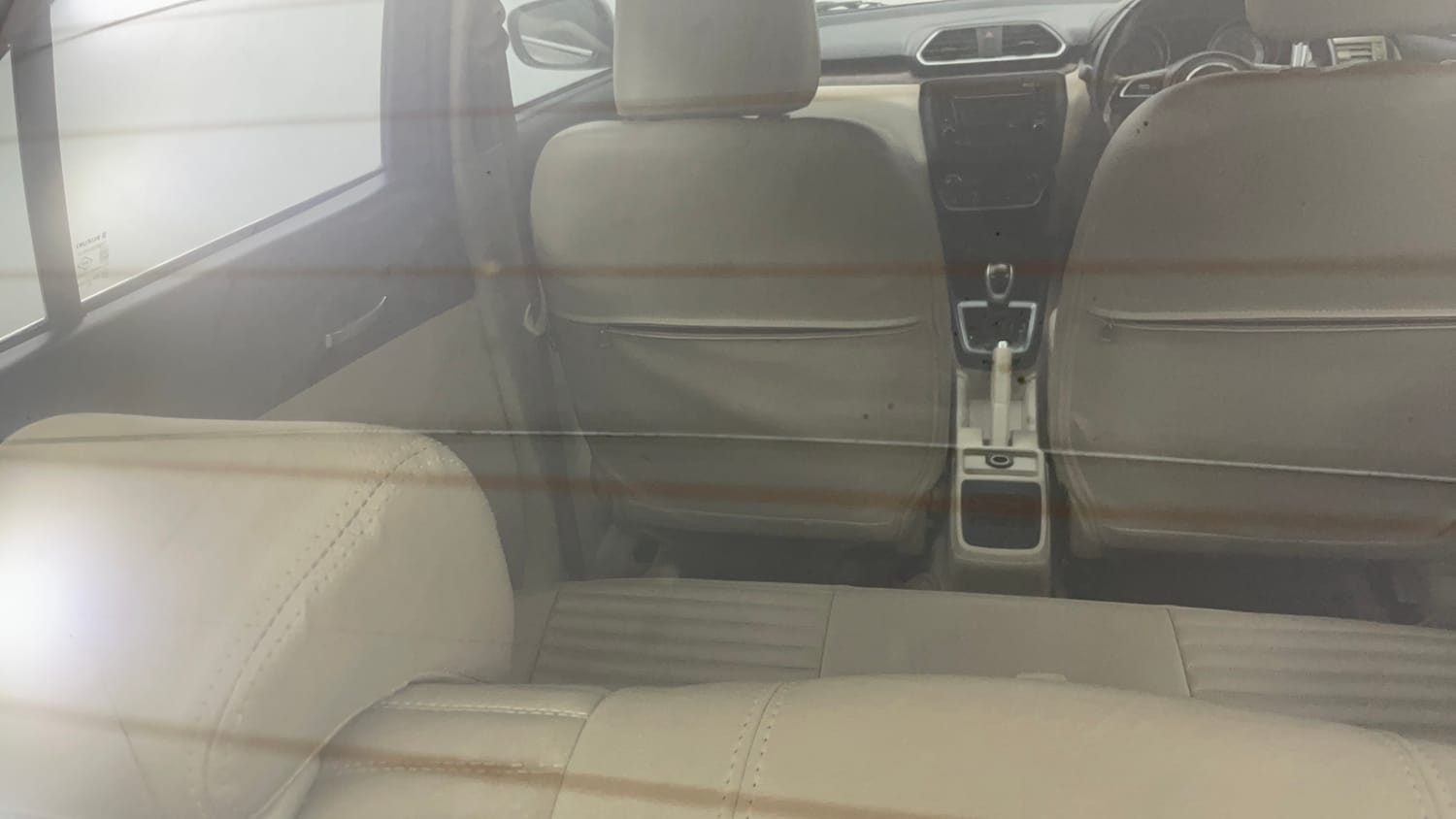 Used 2019 Maruti Suzuki Dzire ZXi AMT Petrol Automatic top_features Rear defogger